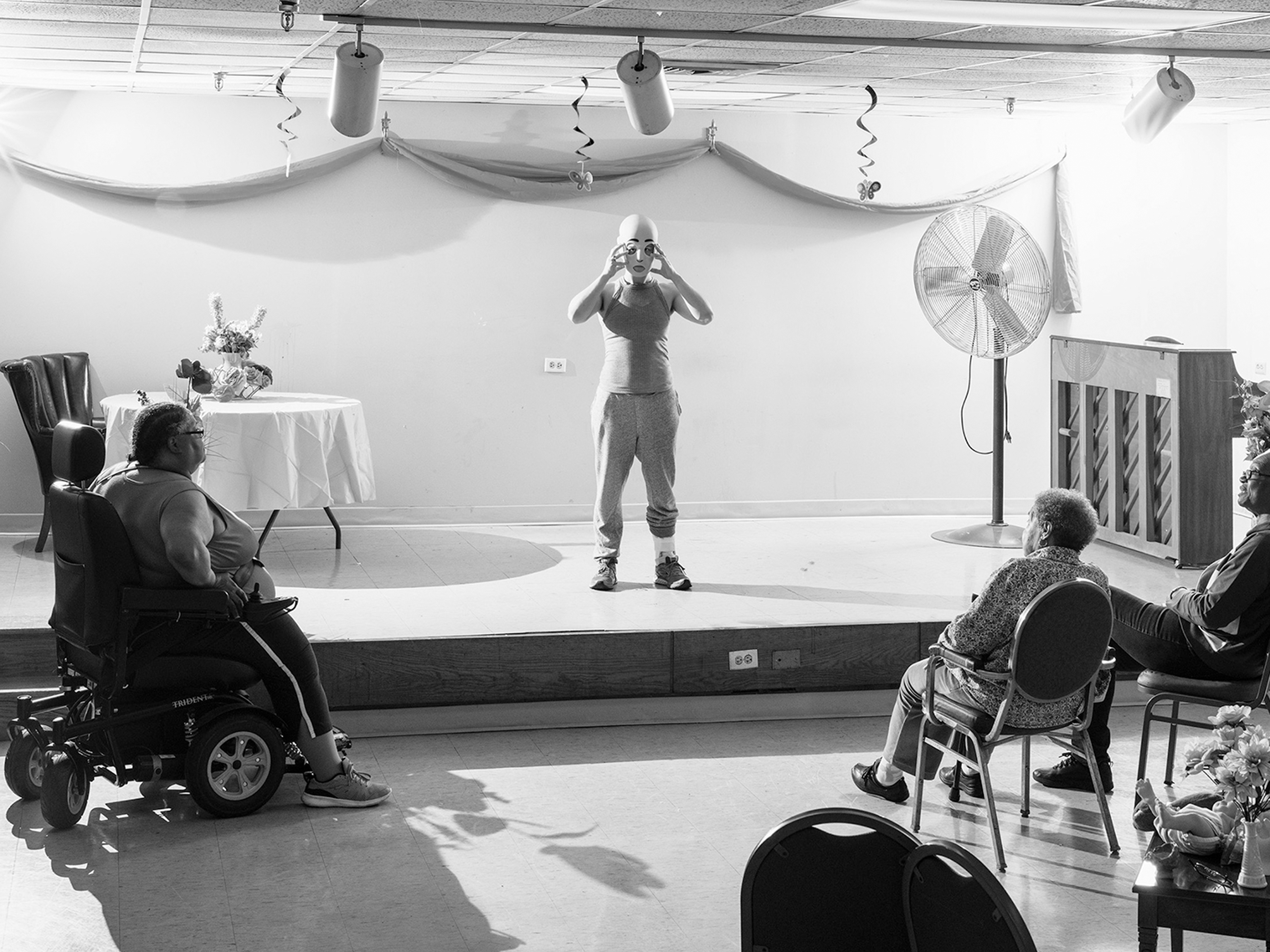 masked person on stage